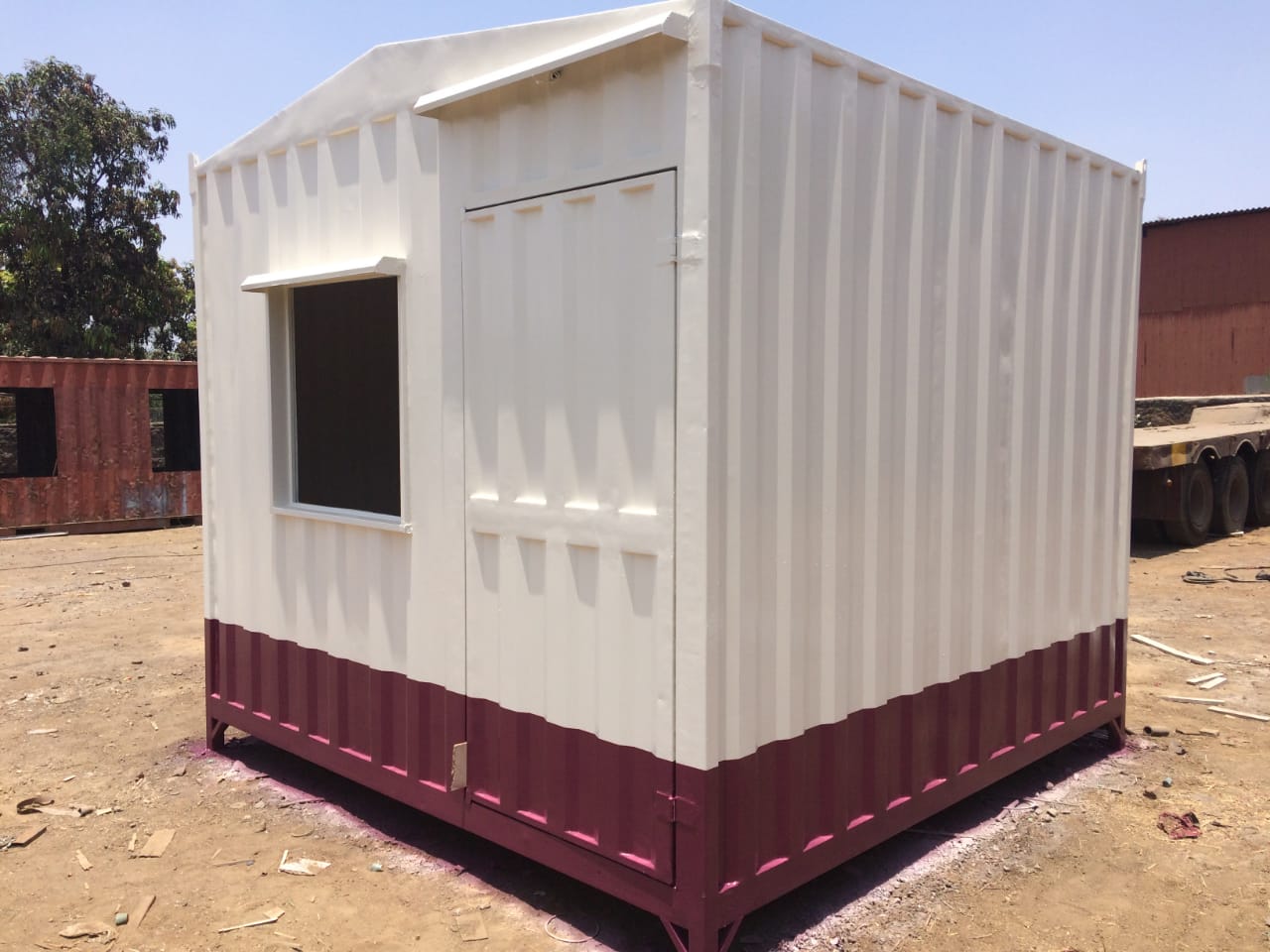 Portable cabin built by Vikranta Cargo with window and steel door
